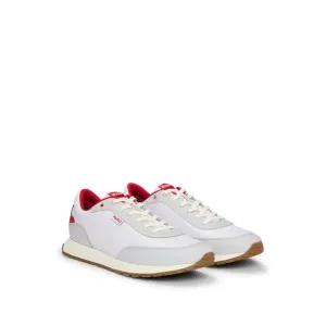 Mixed-material trainers with logo flag