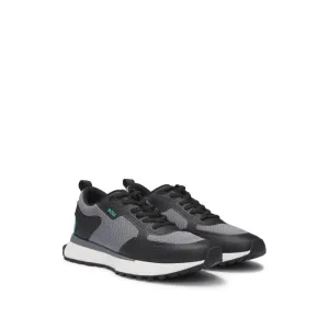 Mixed-material trainers with mesh details and branding